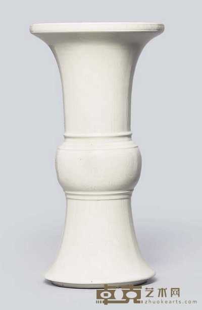 KANGXI (1662-1722) A WHITE-GLAZED INCISED VASE, GU 